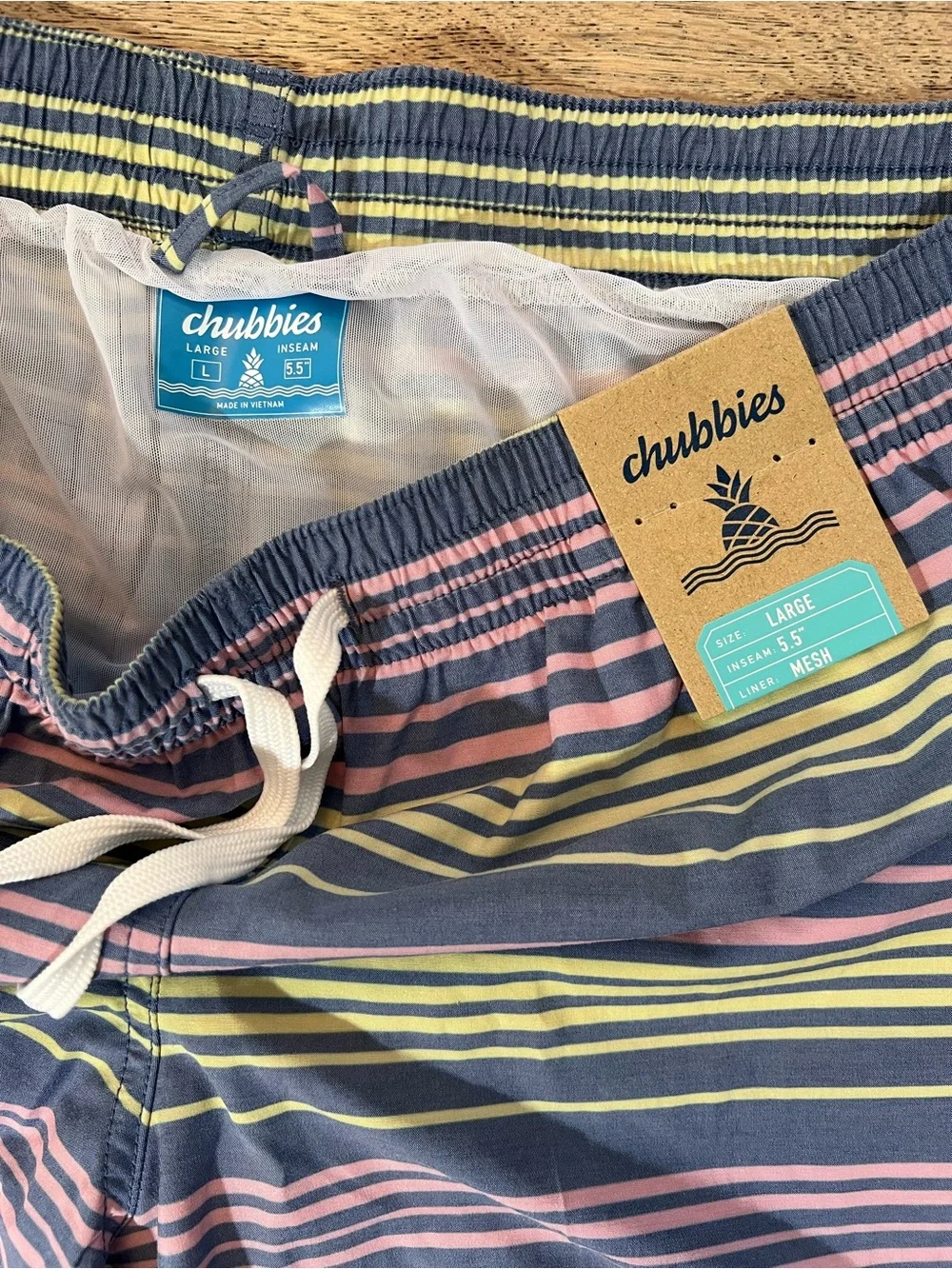 chubbies Navy Swim Trunks with Pink & Yellow Stripes